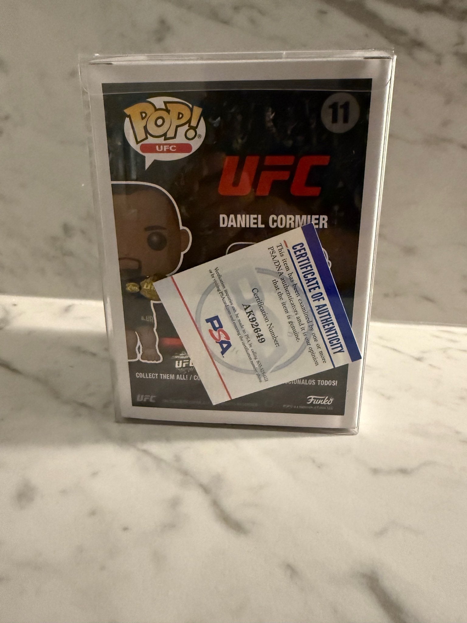 Daniel Cormier Signed Funko Pop – PSA/DNA – HOF 22 Inscription – UFC Double Champ