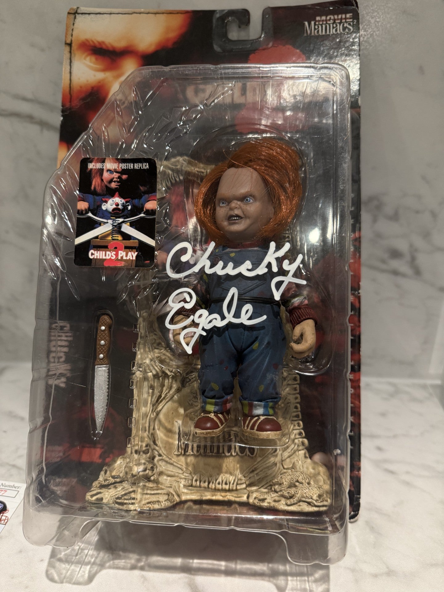 Child’s Play Chucky Signed McFarlane Movie Maniacs Action Figure