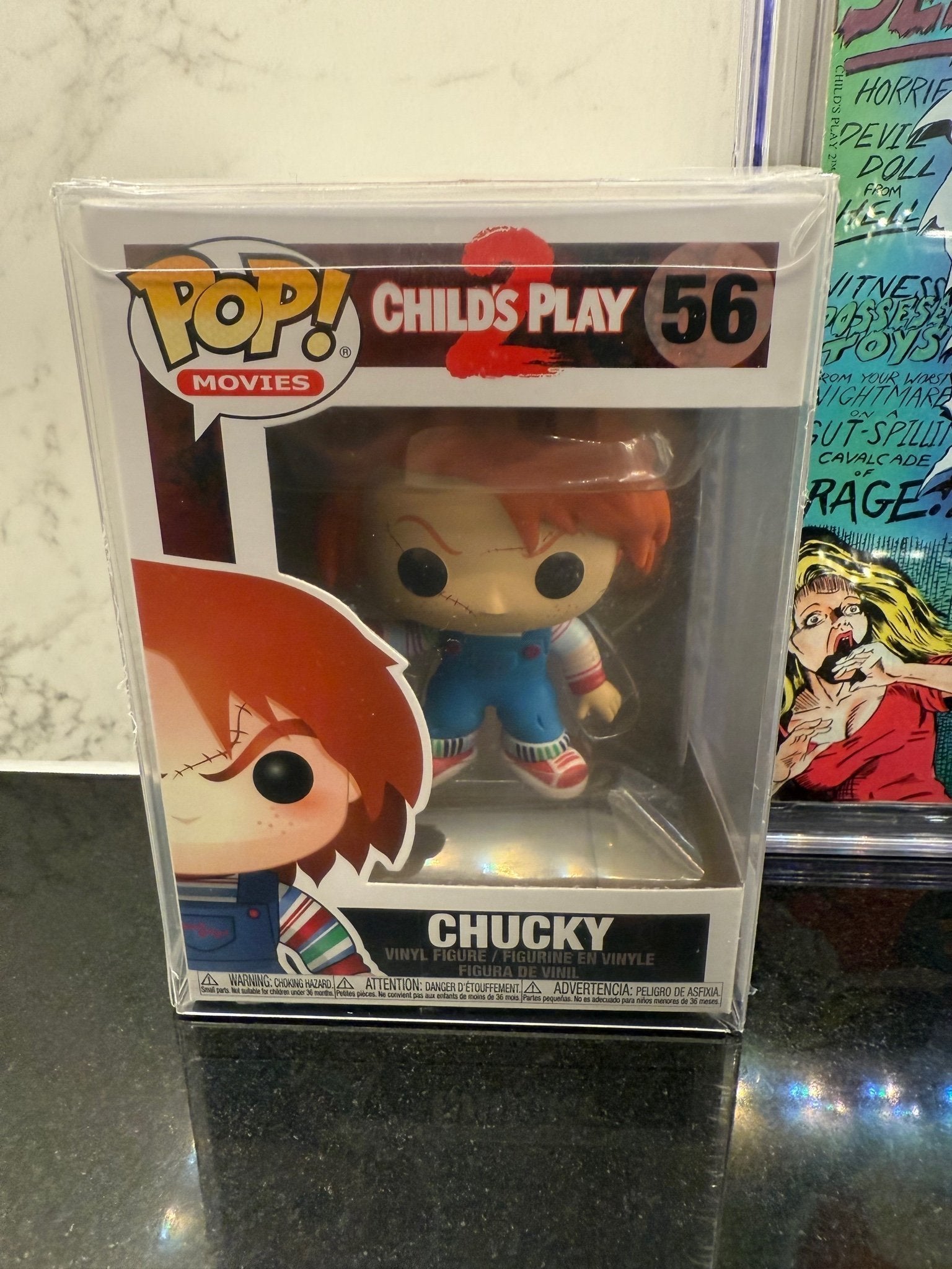 Child’s Play #1 – CGC 8.0 – Signed & Quoted by Ed Gale – Includes Chucky Funko Pop – Horror Collectible